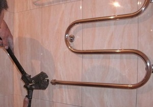 Демонтаж полотенцесушителя в ванной в Нижневартовске